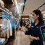 Store associate scanning clothing with a handheld RFID reader